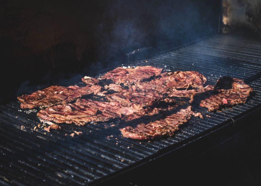 Carne asada grilling on the flat top